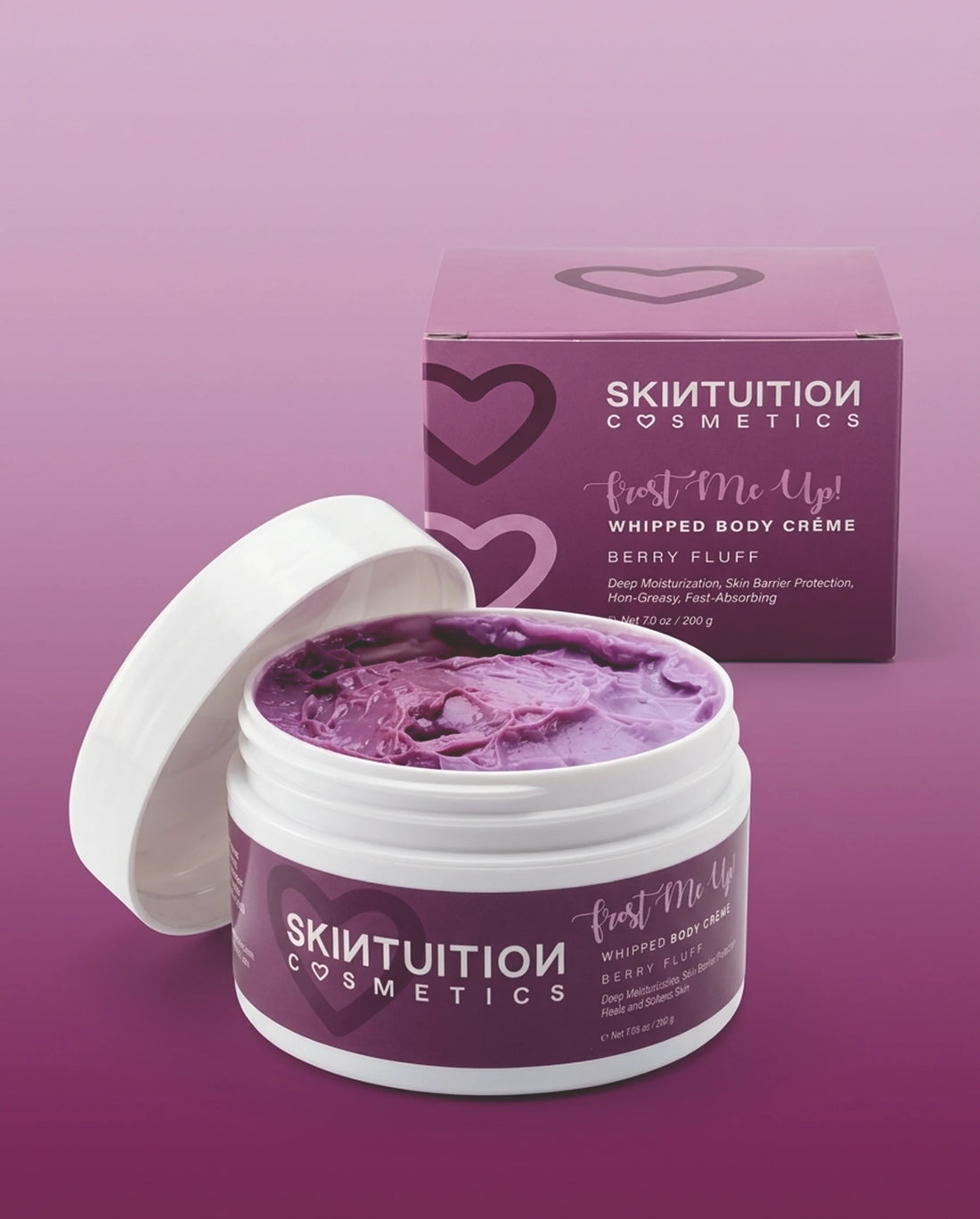 Hand holding Skintuition Cosmetics Berry Fluff whipped body cream, a lightweight non-greasy body butter for soft glowing skin